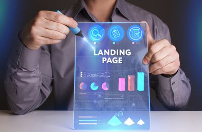 A man holding a sign that says landing page