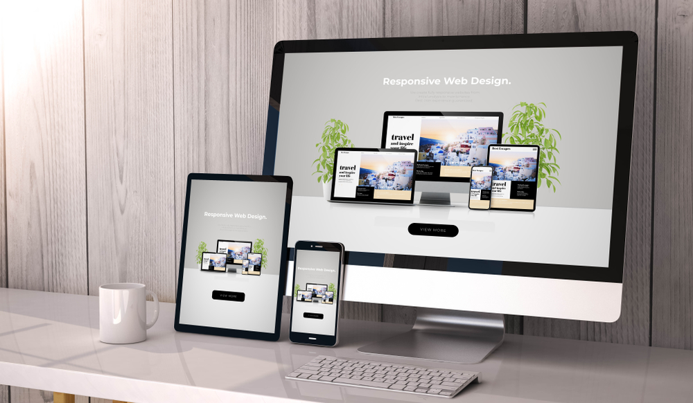 Digital generated devices on desktop, responsive cool website design on screen. 
